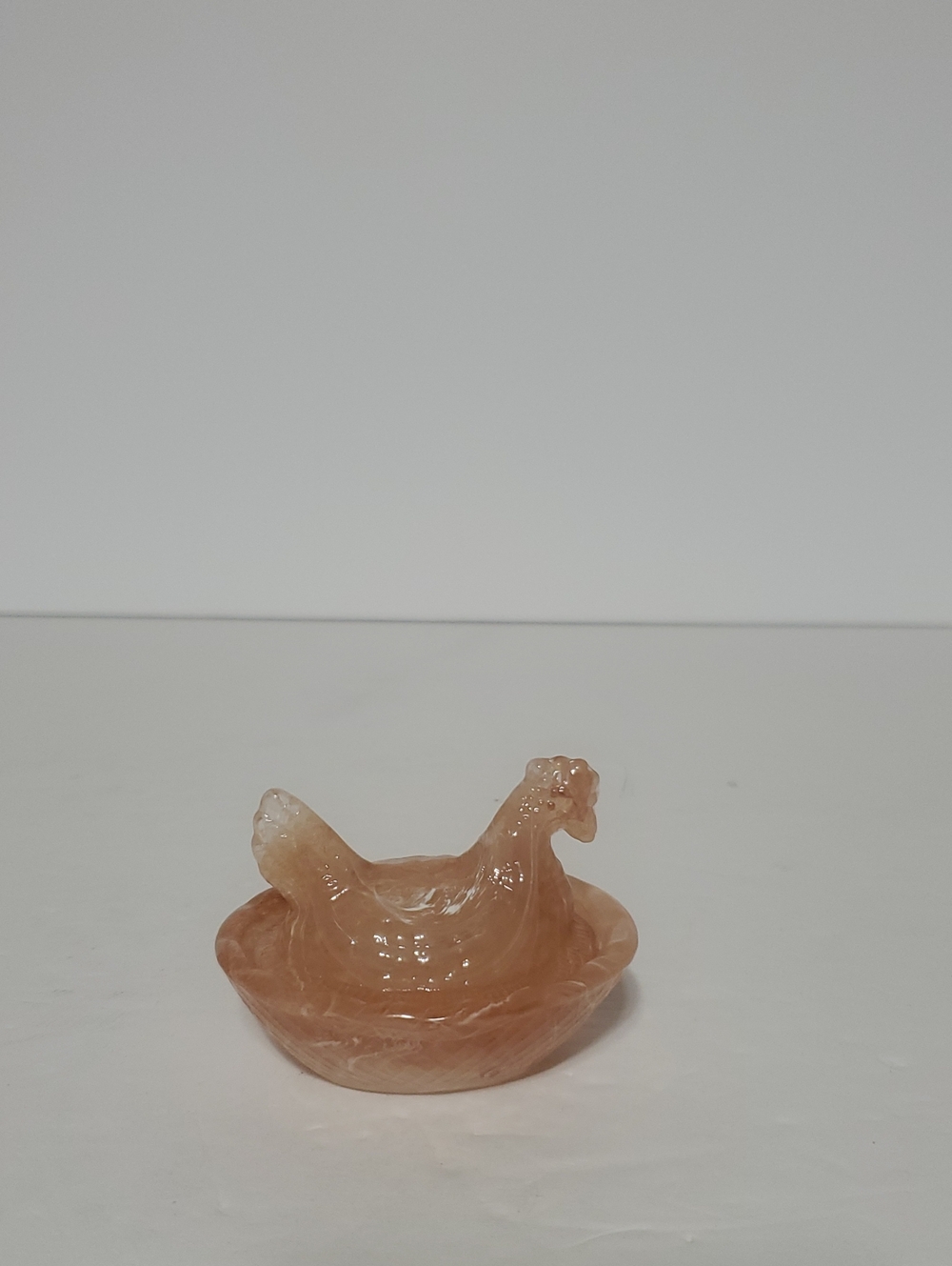 Amber Swirl Hen On Nest